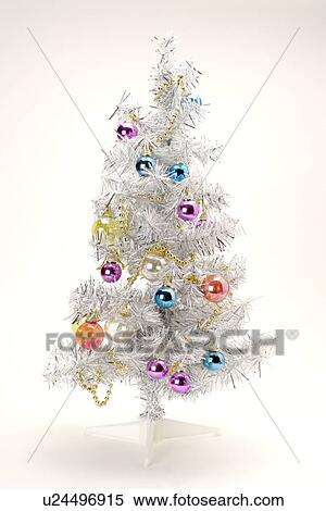 Stock Photography - Christmas decorations on tree, close-up. Fotosearch