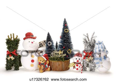 Stock Image - Christmas tree, snowman, stuffy bear and reindeer. Fotosearch