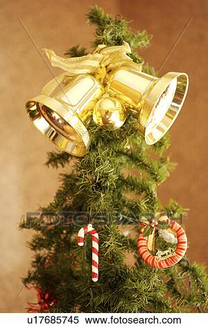 Christmas tree with gold bells View Large Photo Image Stock Photography - Christmas tree with gold bells. Fotosearch