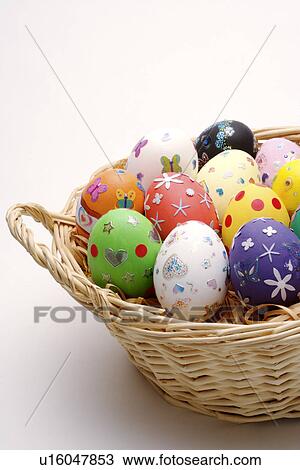 Easter eggs in bamboo basket View Large Photo Image Stock Image - Easter eggs in bamboo basket. Fotosearch