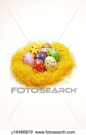 Easter eggs in nest View Large Photo Image Stock Photo - Easter eggs in nest. Fotosearch