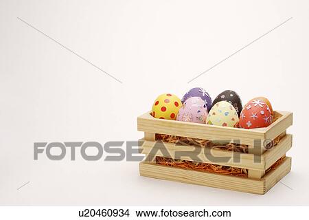 Easter eggs in wooden crate View Large Photo Image Picture - Easter eggs in wooden crate. Fotosearch