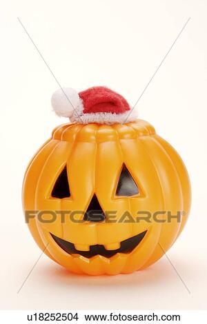 Pumpkin in Santa hat View Large Photo Image Picture - Pumpkin in Santa hat. Fotosearch