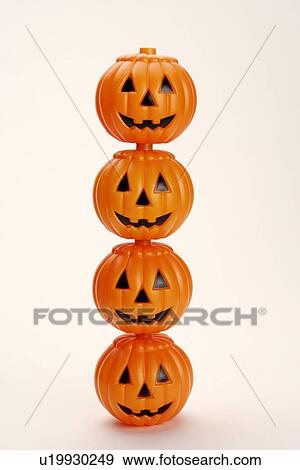 Stacked Halloween Pumpkins View Large Photo Image Stock Photo - Stacked Halloween Pumpkins. Fotosearch