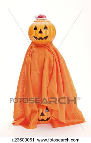 Stacked pumpkins in robe View Large Photo Image Stock Image - Stacked pumpkins in robe. Fotosearch