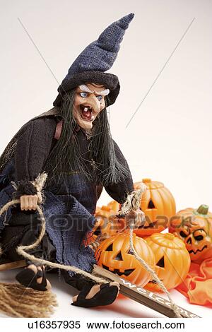 Witch and pumpkins View Large Photo Image Stock Photography - Witch and pumpkins. Fotosearch