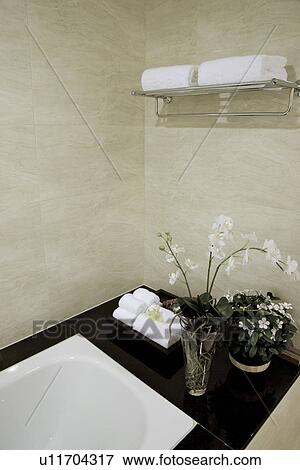 Stock Photo - Bathtub with flower arrangement. Fotosearch