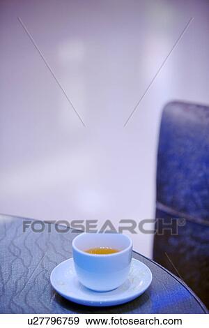 Stock Photo - Cup on table. Fotosearch