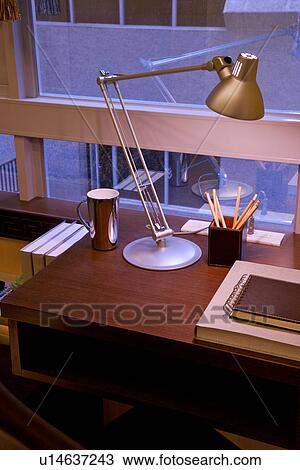 Desk with table lamp and notebook by window View Large Photo Image Stock Image - Desk with table lamp and notebook by window. Fotosearch