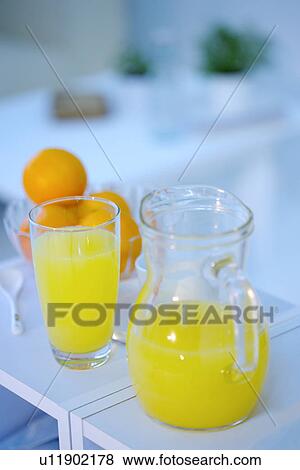 Juice and fruit on table View Large Photo Image Stock Photo - Juice and fruit on table. Fotosearch