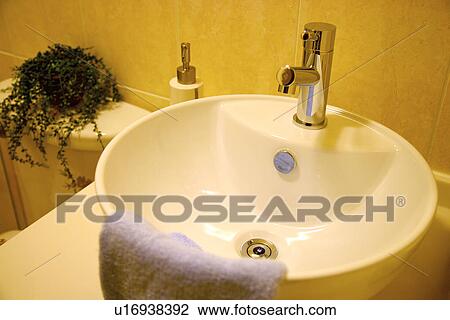Sink with towel View Large Photo Image Stock Image - Sink with towel. Fotosearch