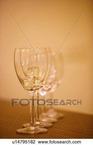 Stock Image - Wineglasses in a row. Fotosearch