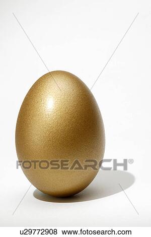Stock Photo - Golden egg, close up. Fotosearch