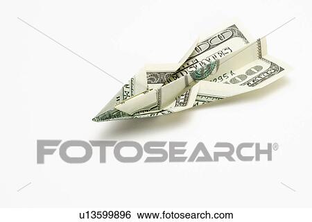 Paper plane made from paper money View Large Photo Image Stock Photograph - Paper plane made from paper money. Fotosearch