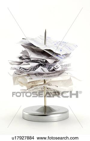 Receipts on metal spike View Large Photo Image Picture - Receipts on metal spike. Fotosearch