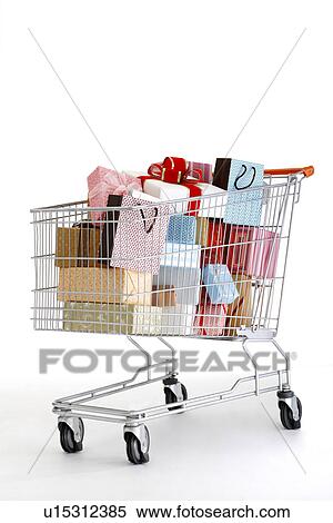 Stock Photography - Shopping bags and gifts in shopping cart. Fotosearch
