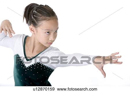 Close-up of girl wearing tracksuit posing View Large Photo Image Stock Photo - Close-up of girl wearing tracksuit posing. Fotosearch