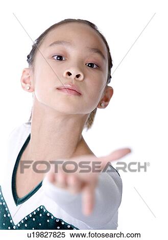 Stock Photography - Close-up of girl wearing tracksuit posing. Fotosearch