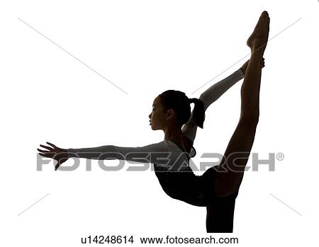 Girl practicing gymnastic pose on pad, silhouette View Large Photo Image Picture - Girl practicing gymnastic pose on pad, silhouette. Fotosearch