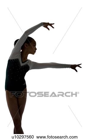Girl practicing gymnastic pose on pad, silhouette View Large Photo Image Stock Image - Girl practicing gymnastic pose on pad, silhouette. Fotosearch