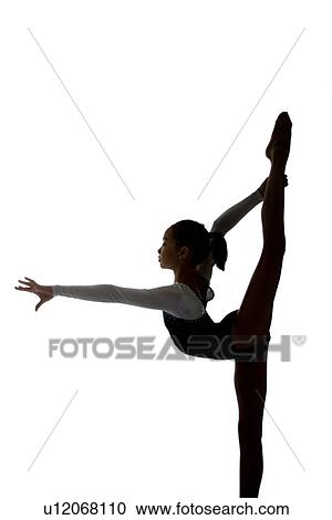 Girl practicing gymnastic pose on pad, silhouette View Large Photo Image Stock Image - Girl practicing gymnastic pose on pad, silhouette. Fotosearch
