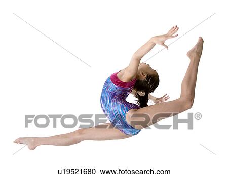 Girl practicing gymnastic pose, side view View Large Photo Image Stock Image - Girl practicing gymnastic pose, side view. Fotosearch