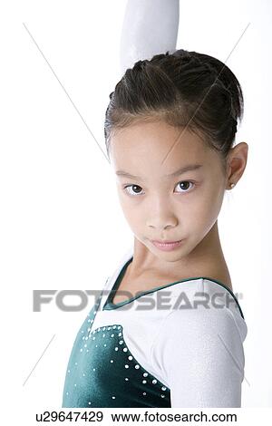 Girl wearing tracksuit posing, side view View Large Photo Image Stock Photo - Girl wearing tracksuit posing, side view. Fotosearch