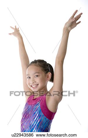 Portrait of a girl standing with her arm raised, Panoramic View Large Photo Image Stock Photograph - Portrait of a girl standing with her arm raised, Panoramic. Fotosearch