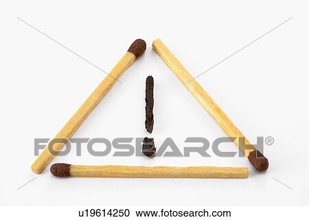 Stock Image - Matchsticks in triangle shape. Fotosearch