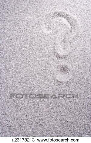 Stock Image - Question mark drawn in white sand. Fotosearch