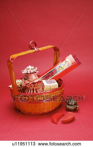 A basket with incenses and ghost money for Tomb Sweeping Day View Large Photo Image Stock Image - A basket with incenses and ghost money for Tomb Sweeping Day. Fotosearch
