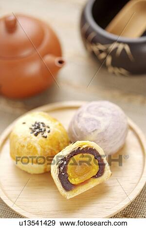 Egg York Pastry with Teapot View Large Photo Image Stock Photo - Egg York Pastry with Teapot. Fotosearch