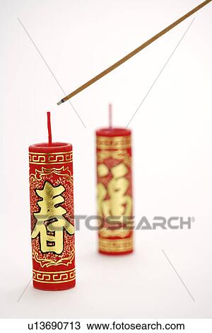Incense about to lit firecracker View Large Photo Image Stock Image - Incense about to lit firecracker. Fotosearch