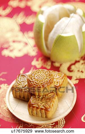 Mooncakes and peeled pomelo View Large Photo Image Stock Photo - Mooncakes and peeled pomelo. Fotosearch