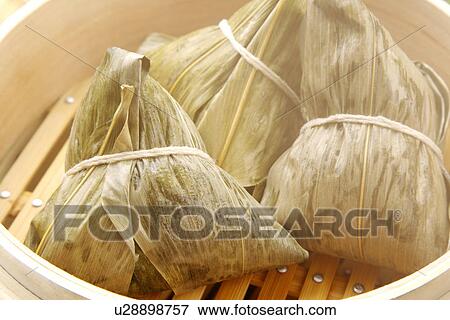 Steamer with chinese rice dumplings View Large Photo Image Stock Photo - Steamer with chinese rice dumplings. Fotosearch
