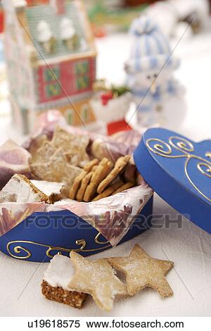 Stock Photography - A box of cookies and snowman. Fotosearch