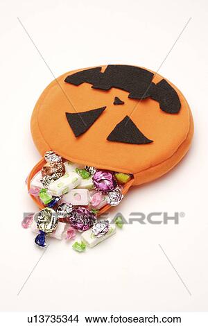 Candies spilling out of box View Large Photo Image Picture - Candies spilling out of box. Fotosearch