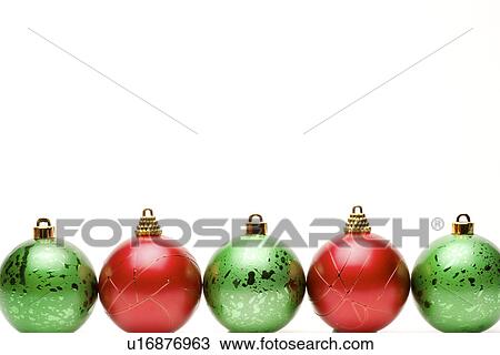 Christmas baubles in a row View Large Photo Image Stock Image - Christmas baubles in a row. Fotosearch