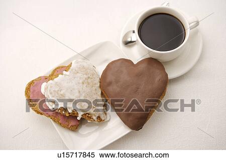 Stock Photography - Heart shaped chocolates and coffee, close up. Fotosearch