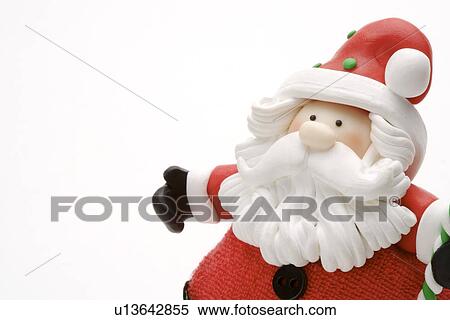 Santa Claus Figurine, close up View Large Photo Image Stock Photography - Santa Claus Figurine, close up. Fotosearch