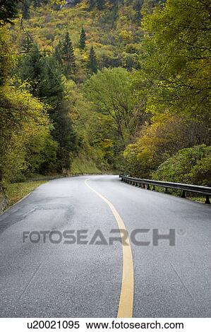 Stock Photography - China, Jiuzhaigou, Empty road. Fotosearch
