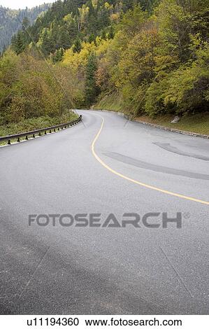 China, Jiuzhaigou, Road in non-urban setting View Large Photo Image Stock Image - China, Jiuzhaigou, Road in non-urban setting. Fotosearch