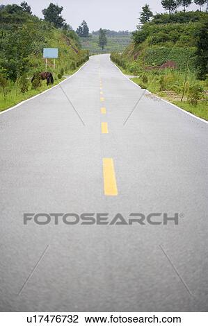 Stock Image - China, Mt. Huangshan, Empty road. Fotosearch