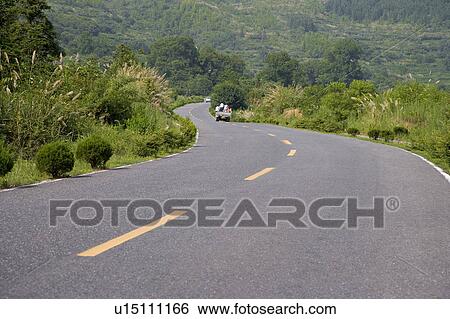 Stock Photograph - China, Mt. Huangshan, Road in non-urban setting. Fotosearch