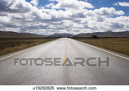 China, Ruoergai Grassland, A long, straight rural road View Large Photo Image Stock Photograph - China, Ruoergai Grassland, A long, straight rural road. Fotosearch