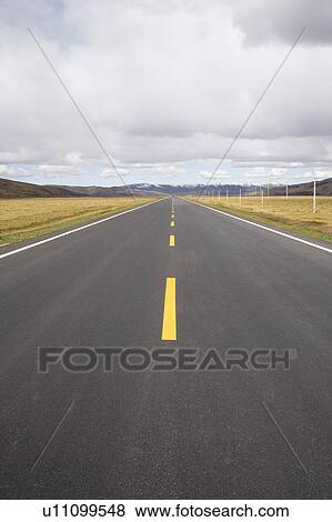 Stock Photo - China, Ruoergai Grassland, Empty road. Fotosearch