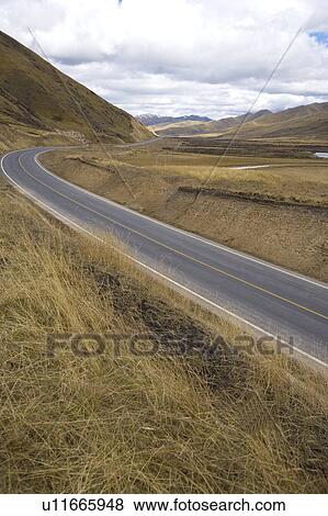 Stock Photo - China, Ruoergai Grassland, Empty road. Fotosearch
