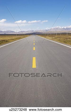 Stock Photo - China, Ruoergai Grassland, Empty road. Fotosearch