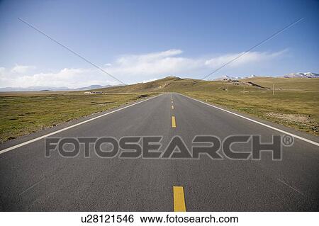 Stock Photograph - China, Ruoergai Grassland, Empty road. Fotosearch