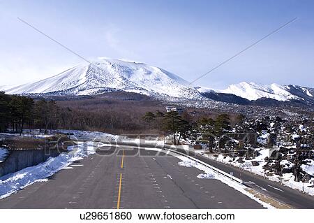 Empty road and snowcapped mountain View Large Photo Image Stock Image - Empty road and snowcapped mountain. Fotosearch